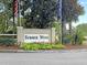 Community entrance sign with mature landscaping, providing an inviting welcome to Summer Wood at 601 Buckthorn Cir, Summerville, SC 29483
