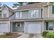 Charming townhome featuring an attached garage and well-maintained landscaping at 601 Buckthorn Cir, Summerville, SC 29483