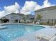 Community pool with lounge chairs and tidy landscaping at 601 Buckthorn Cir, Summerville, SC 29483