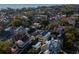 Expansive aerial view of Charleston neighborhood featuring charming historic homes and lush greenery at 61 Tradd St, Charleston, SC 29401