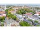 Charming Charleston aerial view with historic architecture, lush green trees, and waterfront views at 61 Tradd St, Charleston, SC 29401