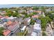 An aerial view of historic Charleston showcasing architecture, tree-lined streets, and waterfront views at 61 Tradd St, Charleston, SC 29401