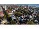 Stunning aerial view of historic neighborhood featuring colorful homes and vibrant cityscape beyond at 61 Tradd St, Charleston, SC 29401