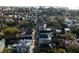 Beautiful aerial view of historic Charleston street with a mix of charming homes and mature trees at 61 Tradd St, Charleston, SC 29401