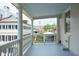 Picturesque balcony offering views of charming architecture, showcasing the neighborhood's beauty and tranquility at 61 Tradd St, Charleston, SC 29401