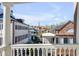 Scenic view from the porch overlooking historic buildings and a church steeple in the distance at 61 Tradd St, Charleston, SC 29401