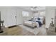 This modern bedroom boasts stylish decor, including a bed, accent pillows, and a chic bench at 703 Canary Dr, Charleston, SC 29414
