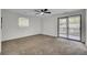 Bedroom featuring carpet, a ceiling fan, and access to outdoor patio at 703 Canary Dr, Charleston, SC 29414