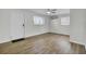 Bright bedroom features a ceiling fan, two windows, and modern flooring for a clean, welcoming space at 703 Canary Dr, Charleston, SC 29414