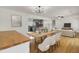 Dining area offering a view of the modern kitchen and open living space at 703 Canary Dr, Charleston, SC 29414