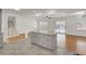 Bright, open kitchen layout with a view of the dining area and access to the backyard at 703 Canary Dr, Charleston, SC 29414