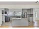 Open concept kitchen with stainless steel appliances, granite countertops, and central island at 703 Canary Dr, Charleston, SC 29414