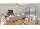 Inviting living room with sliding glass doors to the backyard and ample seating at 703 Canary Dr, Charleston, SC 29414