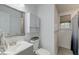 Clean and updated bathroom featuring a vanity with mirror, toilet, and tiled shower with a curtain at 746 Cartwright Dr, Charleston, SC 29414