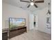 Bright room with laminate floors, neutral walls, a modern ceiling fan, and ample natural light at 746 Cartwright Dr, Charleston, SC 29414