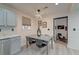 Dining area features a modern light fixture and view into a separate living area at 746 Cartwright Dr, Charleston, SC 29414