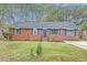 Charming red brick home with a well-maintained front yard at 746 Cartwright Dr, Charleston, SC 29414