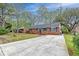 Charming brick home with mature trees and landscaping at 746 Cartwright Dr, Charleston, SC 29414