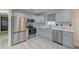 Modern kitchen with stainless steel appliances and grey cabinets at 746 Cartwright Dr, Charleston, SC 29414