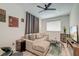 Cozy living room with neutral tones, comfortable seating, and a large window for natural light at 746 Cartwright Dr, Charleston, SC 29414