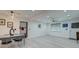 Open living area with shiplap accent walls, recessed lighting, and modern décor at 746 Cartwright Dr, Charleston, SC 29414