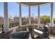 Covered balcony with seating provides views of the surrounding neighborhood at 772 Post Oak Dr, Mount Pleasant, SC 29464