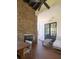 Covered porch with fireplace, outdoor seating, and access to the yard at 772 Post Oak Dr, Mount Pleasant, SC 29464