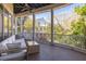 Covered porch with outdoor seating, fan, and nice views at 772 Post Oak Dr, Mount Pleasant, SC 29464