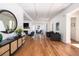 Bright entryway with gleaming wood floors, modern furnishings, and seamless access to adjacent spaces at 772 Post Oak Dr, Mount Pleasant, SC 29464