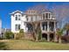 Lovely multi-story home with a curved porch and balcony area, large yard, and brick and siding facade at 772 Post Oak Dr, Mount Pleasant, SC 29464