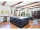 Stylish kitchen featuring a large island with seating, modern appliances, and hardwood floors at 772 Post Oak Dr, Mount Pleasant, SC 29464