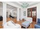 Bright living room with hardwood floors, coffered ceilings, and view to the living area beyond at 772 Post Oak Dr, Mount Pleasant, SC 29464
