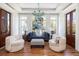 Cozy sitting room featuring stylish seating arrangements, natural light, and elegant decor at 772 Post Oak Dr, Mount Pleasant, SC 29464