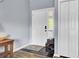 Entryway with coat closet, tile flooring, and a shoe rack for organization at 7940 Parklane Ct # F, North Charleston, SC 29418