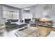 Bright living room featuring hardwood floors, fireplace and an open floor plan at 7940 Parklane Ct # F, North Charleston, SC 29418