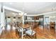 Spacious dining area features hardwood floors, seamlessly connecting to the kitchen and living spaces at 835 Hale St, Charleston, SC 29412
