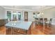 Bright, open kitchen flows into the dining area, featuring lots of natural light and seamless movement at 835 Hale St, Charleston, SC 29412