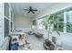 Sunroom with lots of natural light featuring a cat tree, plants, and comfortable seating at 835 Hale St, Charleston, SC 29412
