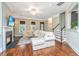 Bright and spacious living room featuring a fireplace, hardwood floors, and a plush sectional sofa at 835 Hale St, Charleston, SC 29412
