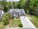 Beautiful brick home with an attached two-car garage and a well manicured lawn at 9411 Harroway Rd, Summerville, SC 29485
