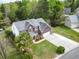 Beautiful brick home with an attached two-car garage and a well manicured lawn at 9411 Harroway Rd, Summerville, SC 29485