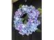 Hydrangea wreath adorning a black front door at 9411 Harroway Rd, Summerville, SC 29485