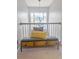 Hallway nook featuring a storage bench with drawers, a soft cushion, and decorative pillows under a chandelier at 9411 Harroway Rd, Summerville, SC 29485