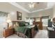 Cozy main bedroom featuring a ceiling fan, dresser and bedside tables at 9411 Harroway Rd, Summerville, SC 29485