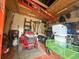Tidy storage shed features tools, lawnmower, and lawn cart at 9411 Harroway Rd, Summerville, SC 29485