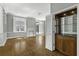 Built-in bar with glass shelving, cabinet space in living area at 1 King St # 209/210, Charleston, SC 29401