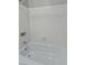 Clean, tiled shower and tub with a safety grip textured bottom at 1 King St # 209/210, Charleston, SC 29401