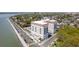 Stunning aerial view of a modern building boasting private balconies and a refreshing swimming pool at 1 King St # 209/210, Charleston, SC 29401