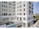 Multi-story building featuring private terraces and an outdoor lounge area at 1 King St # 209/210, Charleston, SC 29401