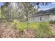 Backyard featuring a lawn, privacy fence, and surrounding trees at 102 Brutus Ln, Summerville, SC 29485